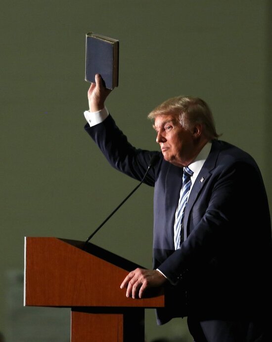 Republican presidential candidate Donald Trump holds up a copy of the Bible he said his mother gave him as a youth during a campaign rally in Council Bluffs, Iowa, on Dec. 29, 2015. Photo courtesy of REUTERS/Lane Hickenbottom *Editors: This photo may only be republished with RNS-TRUMP-LIBERTY, originally transmitted on Jan. 5, 2016, and with RNS-RELIGIOUS-PRESIDENTS, originally transmitted on Jan. 27, 2016.